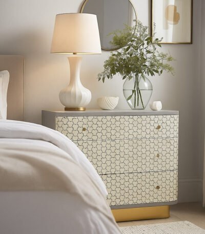 Contemporary Sheesham wood chest of drawers with intricate bone inlay design and gold base accent