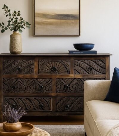 Dark wooden dresser with intricate carvings, featuring a vintage design and spacious drawers for ample storage.