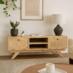 handcrafted Sheesham wooden TV unit with dual carved cabinet shutters and open center shelf in natural finish