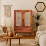 Elegant teak wooden bar cabinet with glass holders, wine bottle racks, and storage shelves, perfect for a modern home bar setup.