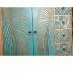 "Handcrafted mango wood chest of drawers with floral carvings and natural green finish – rustic artisan storage cabinet"