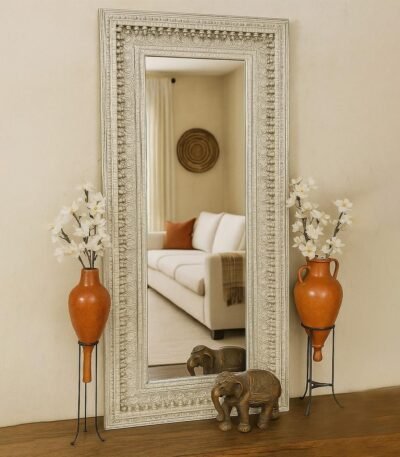 Vertical handcrafted Sheesham wood mirror with silver antique finish and intricate carving