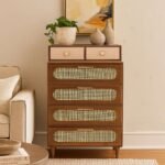 Mid-century modern dresser with four drawers featuring cane fronts and sleek brass handles, perfect for contemporary home decor.